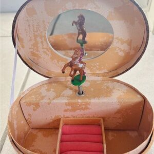 Dashing Horse Oval Shaped Musical Jewelry Box
